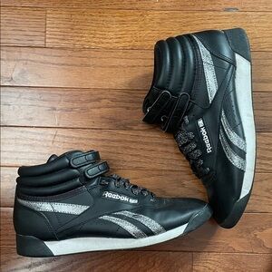 Reebok Women’s Black and Silver High-Top Sneakers